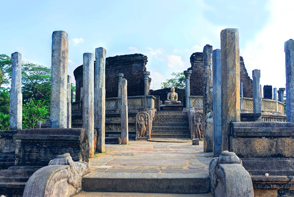Admire Buddhist art at Polonnaruwa